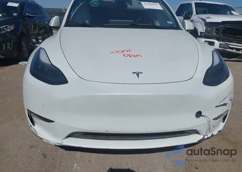2023 Tesla Model Y Awd/Long Range Dual Motor All-Wheel Drive z USA, uszkodzony, nr VIN 7SAYGDEE4PA167788